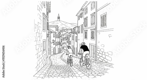 Two cyclists navigate a winding cobblestone street in a European town with buildings and a distant hill