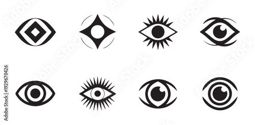 Set of black and white eye symbols with geometric and abstract elements