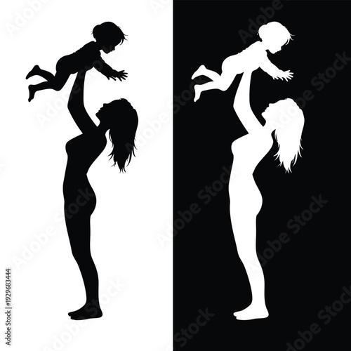 Silhouettes of a happy mother lifting her cheerful baby high up in the air with joy