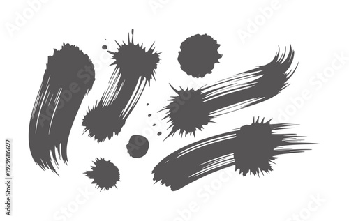 Dark grey ink splatters and brush strokes white