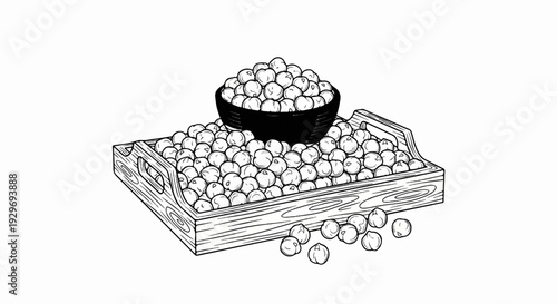 A wooden crate filled with chickpeas overflows into a bowl on top