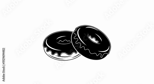 Two glossy, dark iced ring donuts with creamy swirls on a white background