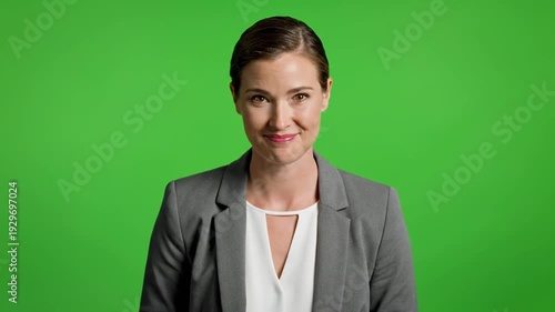 Professional female presenter in a calm controlled delivery style for corporate VIDEO content in a studio setting