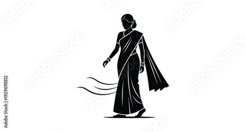 Elegant woman in traditional sari walking a striking black silhouette