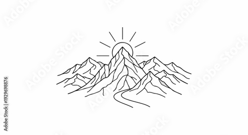 Sunrise over rugged mountains with a winding path leading up