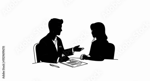Two silhouetted individuals in conversation over a document