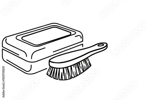 A simple line drawing shows a bar of soap and a brush
