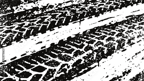 Black tire tracks on white ground showing rugged off road vehicle pattern and texture