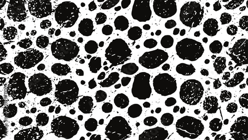 Black and white grunge spotted pattern with irregular shapes and rough texture background