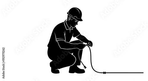Engineering silhouette: An engineer silhouette kneeling while working with cable or cord. A symbol of technological advancements and innovation.