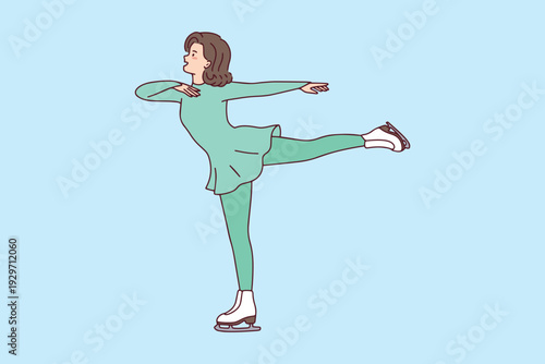 Young skater in green dress performs elegant spiral element on ice. Professional athlete demonstrating balance and grace during intensive winter sports training session at the arena.