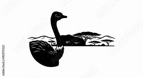 A black silhouette of an ostrich stands in the foreground of an African savanna landscape