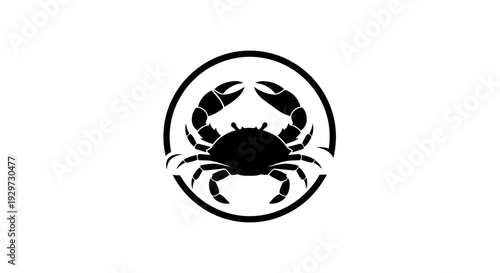 black crab silhouette in circle