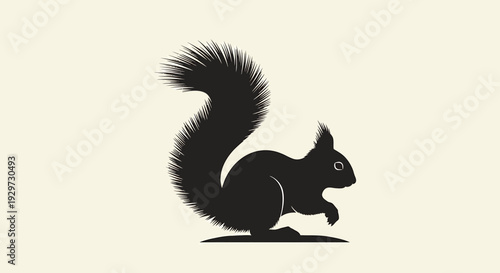 black silhouette of a running squirrel