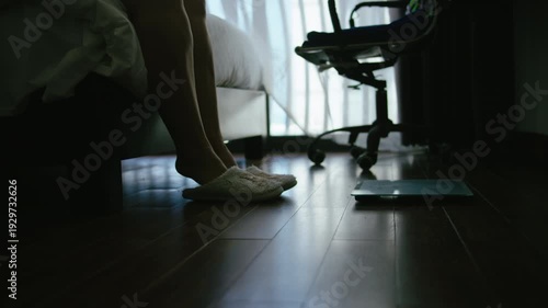 Fat Woman Standing on Weight Scale During Daily Routine