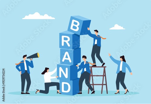 Business team build word BRAND using blocks. Concept of brand awareness, strategies to promoting products and sales, marketing, and advertising to enhance company reputation.