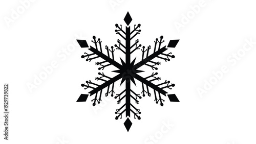Intricate black silhouette of a symmetric snowflake crystal is displayed on a white background representing winter and holiday seasons.