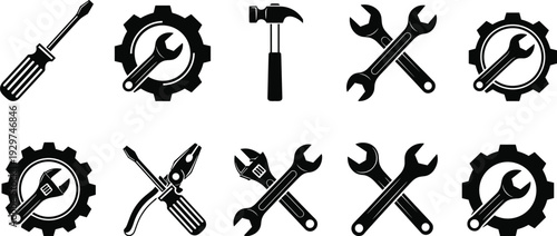 Black industrial tool icon set including screwdriver hammer wrench spanner pliers and gears for construction maintenance engineering repair and hardware design projects