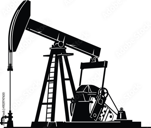 Black and white of an old-fashioned oil pump jack with a ladder and mechanical components industrial