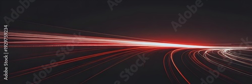 Red light trails from car headlights on a dark road at night, creating a sense of speed and urban movement.