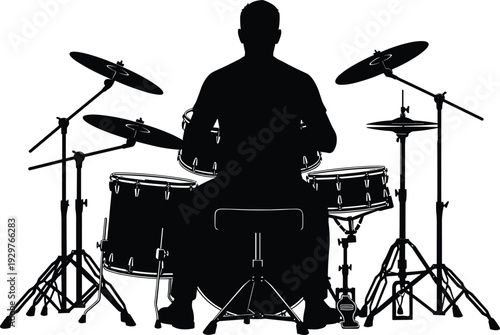 Black silhouette of a professional drummer seen from behind playing a full drum kit isolated on white background for musical performances.