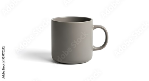 Grey mug with handle side of white background and black handle in.