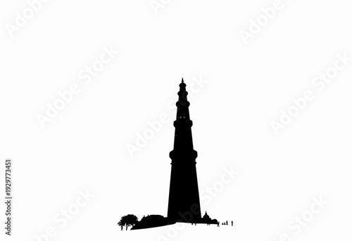 Silhouette of an ancient tower against a stark white sky, showcasing architectural grandeur and historical significance with a surrounding landscape