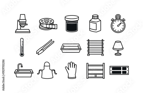 Photography darkroom supplies: enlarger, film reel, developing tank, chemical bottle, timer, thermometer, tongs, tray, drying rack, safelight, sink