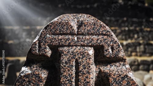 Close Up Of Ancient Stone Carving With Sun Rays Shining On It