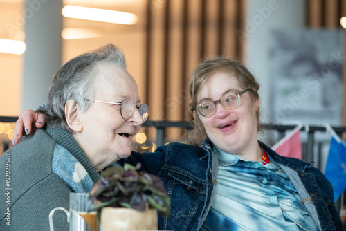 Happy interaction between 87 yo mother and Down Syndrome daughter, Tienen, Belgium