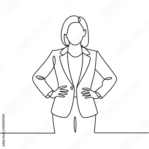 A confident businesswoman standing with her hands on hips