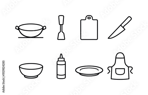 Home stir fry preparation tools: wok pan, spatula, cutting board, chef knife, mixing bowl, sauce bottle, serving plate, apron