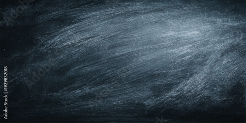 A dark abstract blackboard with an alpha channel featuring white chalk textures that blend into a blue stormy sky filled with night clouds and ocean fog