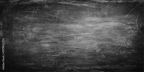 A dark vintage blackboard texture features an aged gray concrete wall pattern with dirty chalk smudges and a distressed black paper frame backdrop