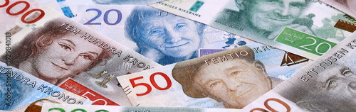 Wallpaper Mural Swedish krona money bills pile on table. Sweden banknotes of SEK currency close up. Torontodigital.ca