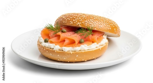 Wallpaper Mural Delicious bagel with smoked salmon, cream cheese, capers, and fresh dill on white plate Torontodigital.ca