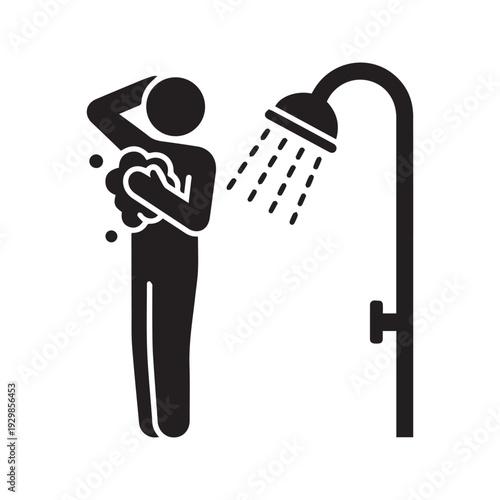 Person taking shower silhouette icon. Man washing body with soap under showerhead vector symbol. Bathing and daily hygiene sign.
