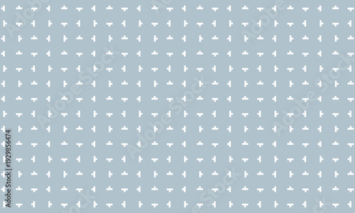 T字マークがコロコロ角度を変えながら並ぶグレーの壁紙