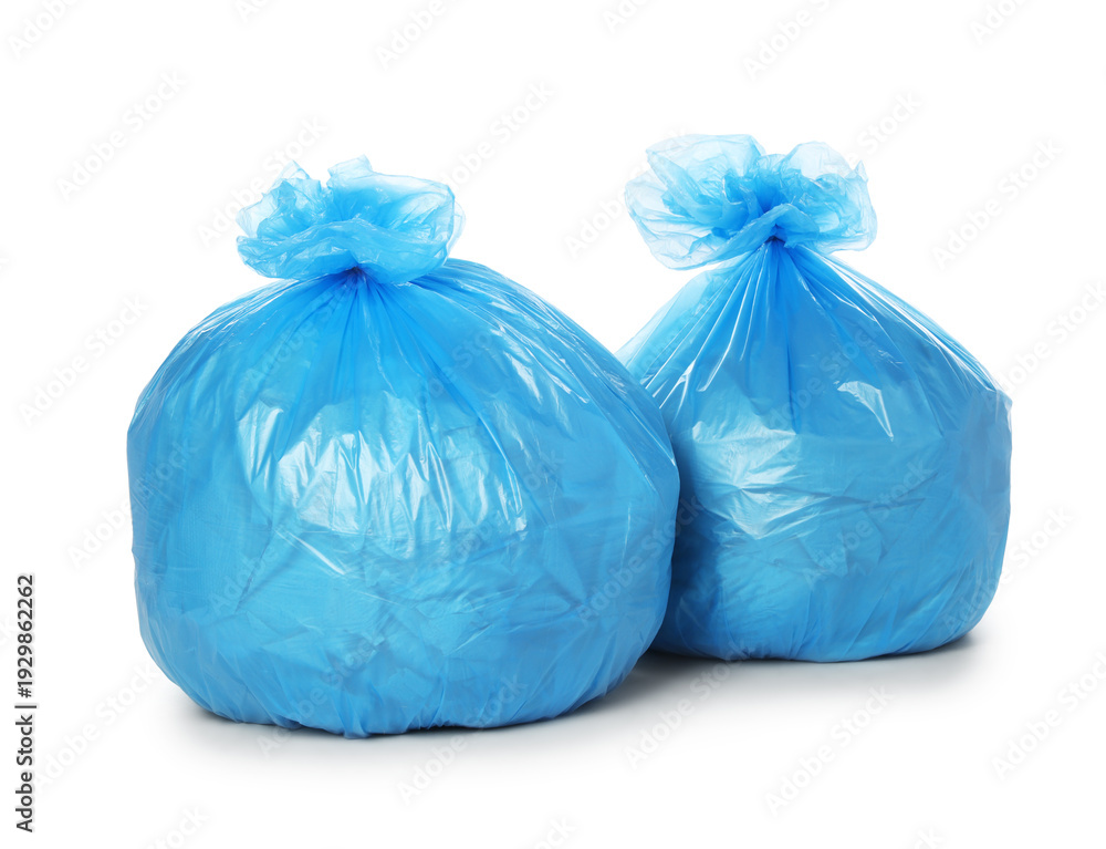 Fototapeta premium Garbage in plastic bags isolated on white
