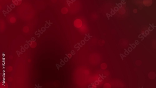 Blurry red bokeh lights create a festive atmosphere perfect for backgrounds, holiday designs, christmas themes, and abstract concepts.
