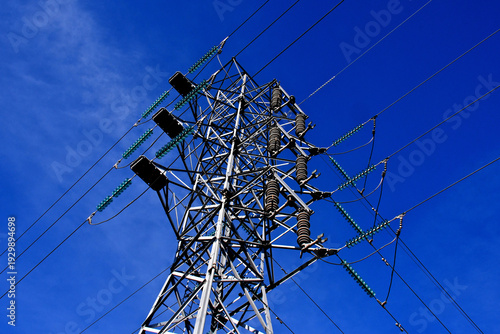 Crowded retrofitted high voltage electrical pylon in Silicon Valley 