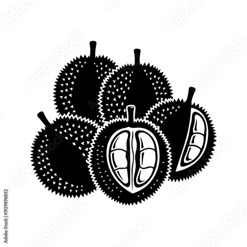 Cluster of sliced soursop fruits with spiky green skin and exposed seeds