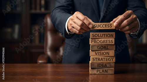 Finalizing Business Success and Progress with Wooden Block Stacking