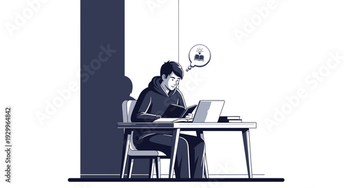 Young man working diligently at his desk with a laptop and tablet.