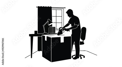 man working at desk with coworker in background