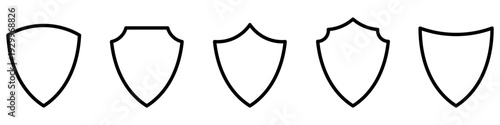 Set of five outline shield icons of various heraldic shapes. Minimalist vector illustration symbolizing protection, security, and reliability.