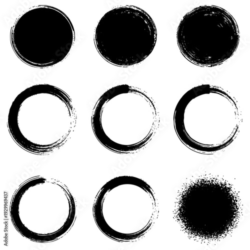 A set of circular graphic elements made in the style of rough brush strokes, prints, and splashes. Includes both solid textured circles and open rings in the enso aesthetic. Vector illustration.