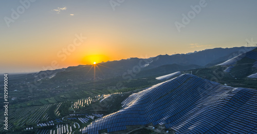 Wallpaper Mural Sunset Over Mountain Solar Farm with Wind Turbines Torontodigital.ca