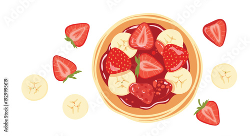 A top down view of a pancake covered in red jam and topped with strawberry and banana slices with extra fruit pieces scattered.