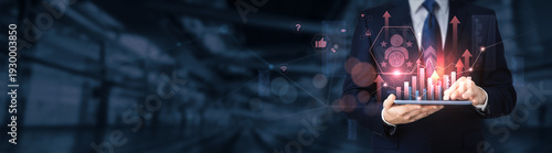 Εκτύπωση καμβά Businessman using a tablet for analyzing customer satisfaction data and information, client feedback, service quality, user experience, customer retention, business analytics